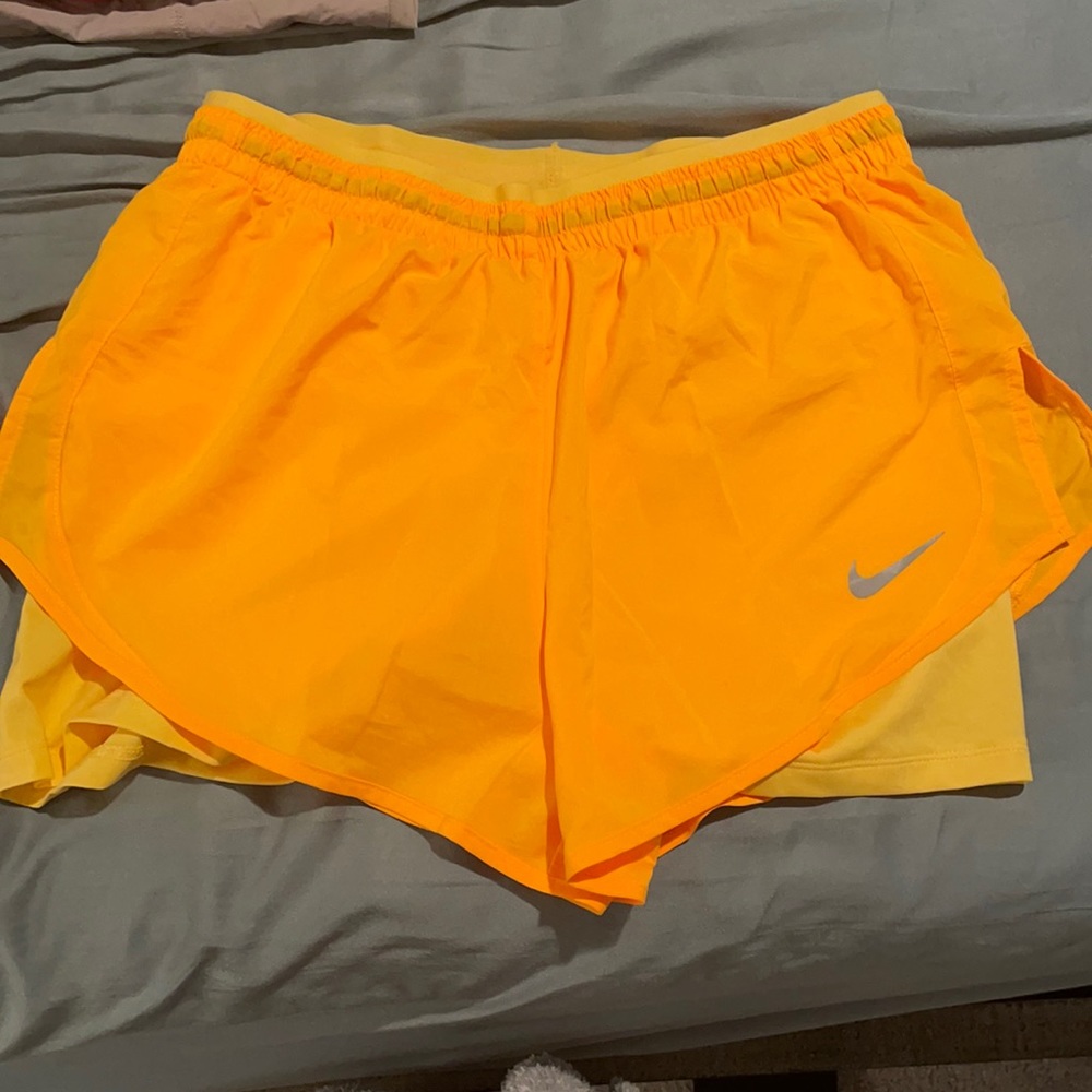 Bright orange nike shorts